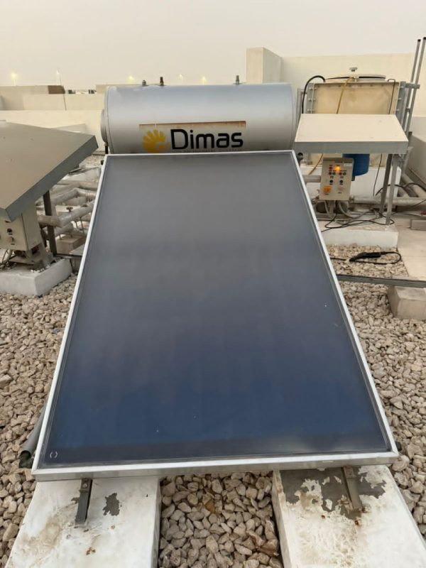 Eagle Trends technician performing solar water heater repair in Abu Dhabi